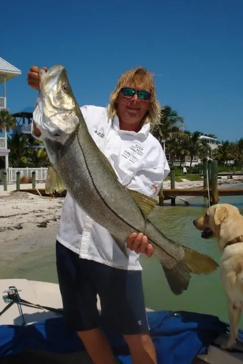 Long hair & a big snook on Sanibel & Captiva charters!