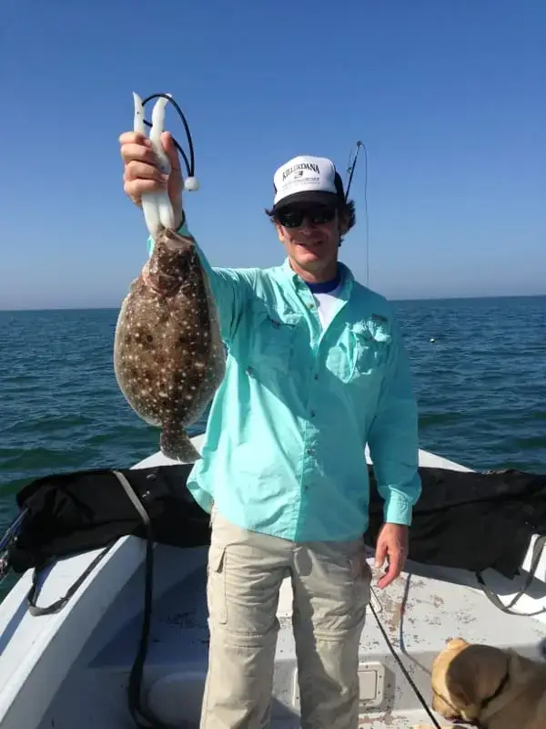 Ed with a big Flounder caught offshore of Captiva on Sanibel & Captiva charters!