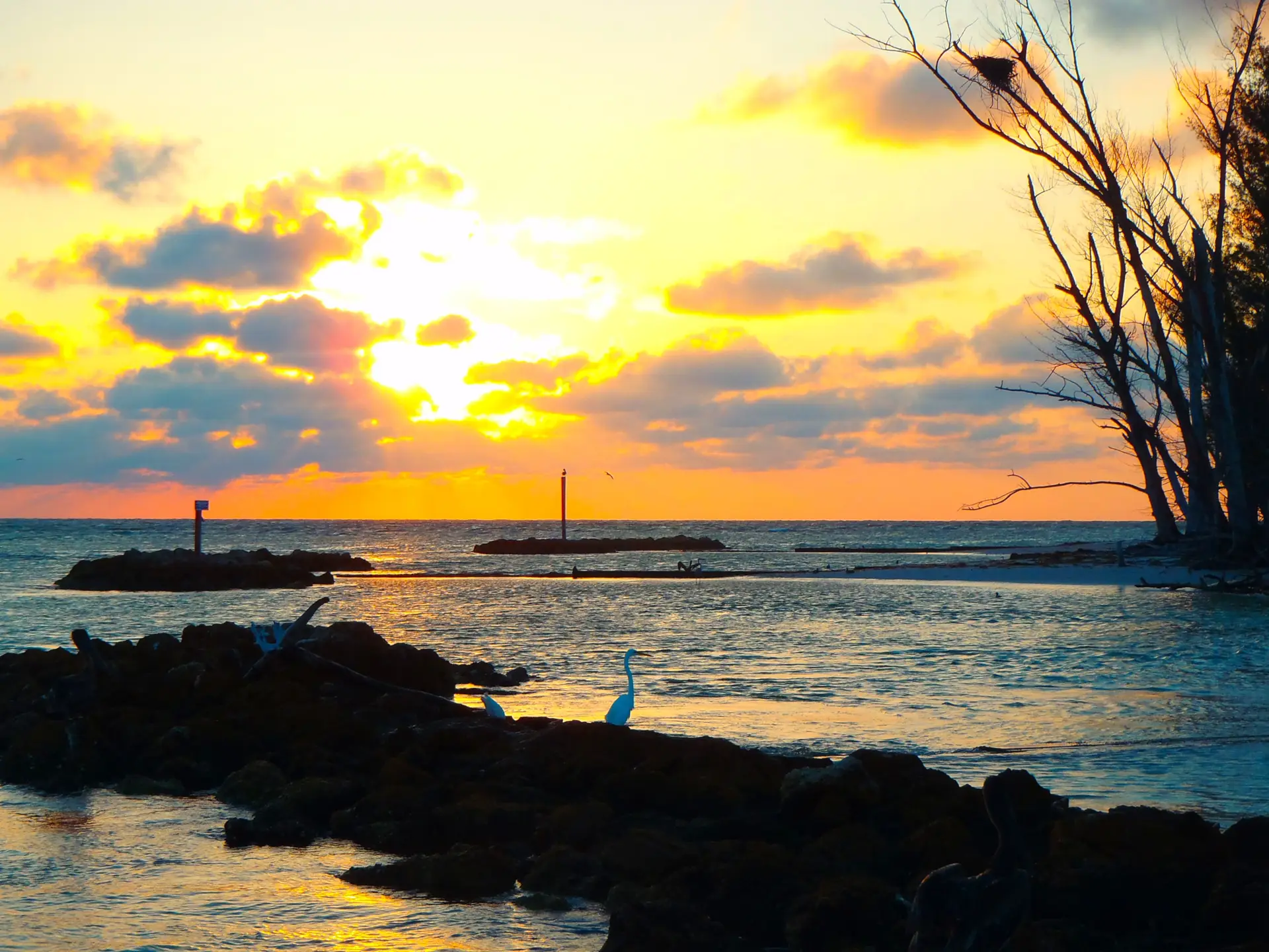 Sunset over Redfish Pass on Sanibel & Captiva charters!