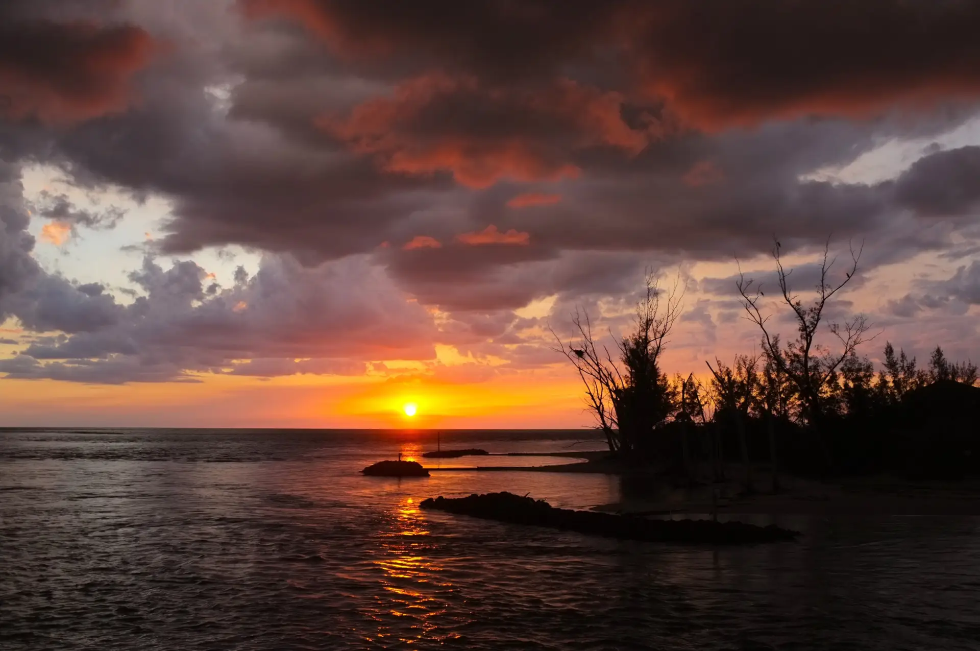 Sunset over Redfish Pass on Sanibel & Captiva charters!