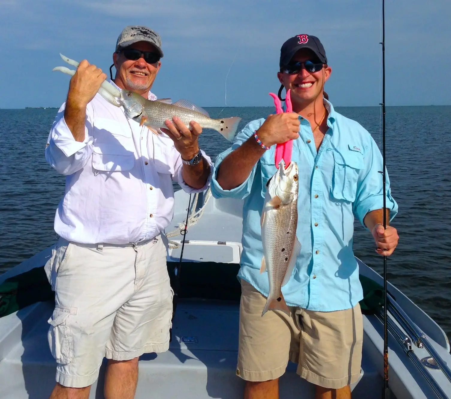 Two Redfish caught on the Sanibel oyster bar, Sanibel & Captiva Islands & Fort Myers Charters & Fishing Guide Service.