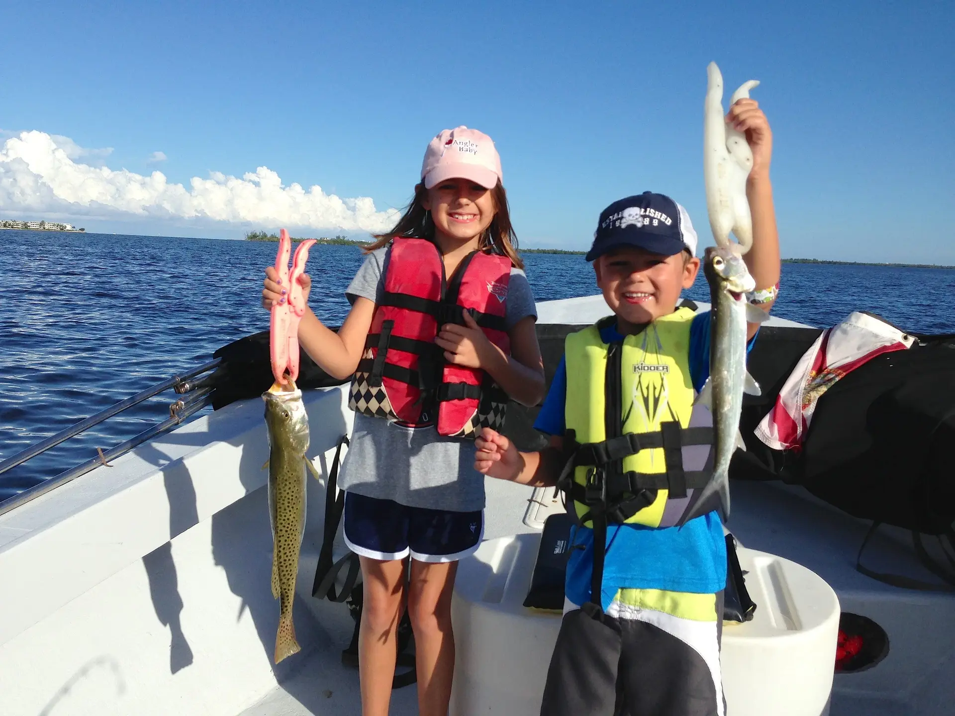 Sea Trout and a Ladyfish caught in Redfish Pass, Sanibel & Captiva Islands & Fort Myers Charters & Fishing Guide Service.